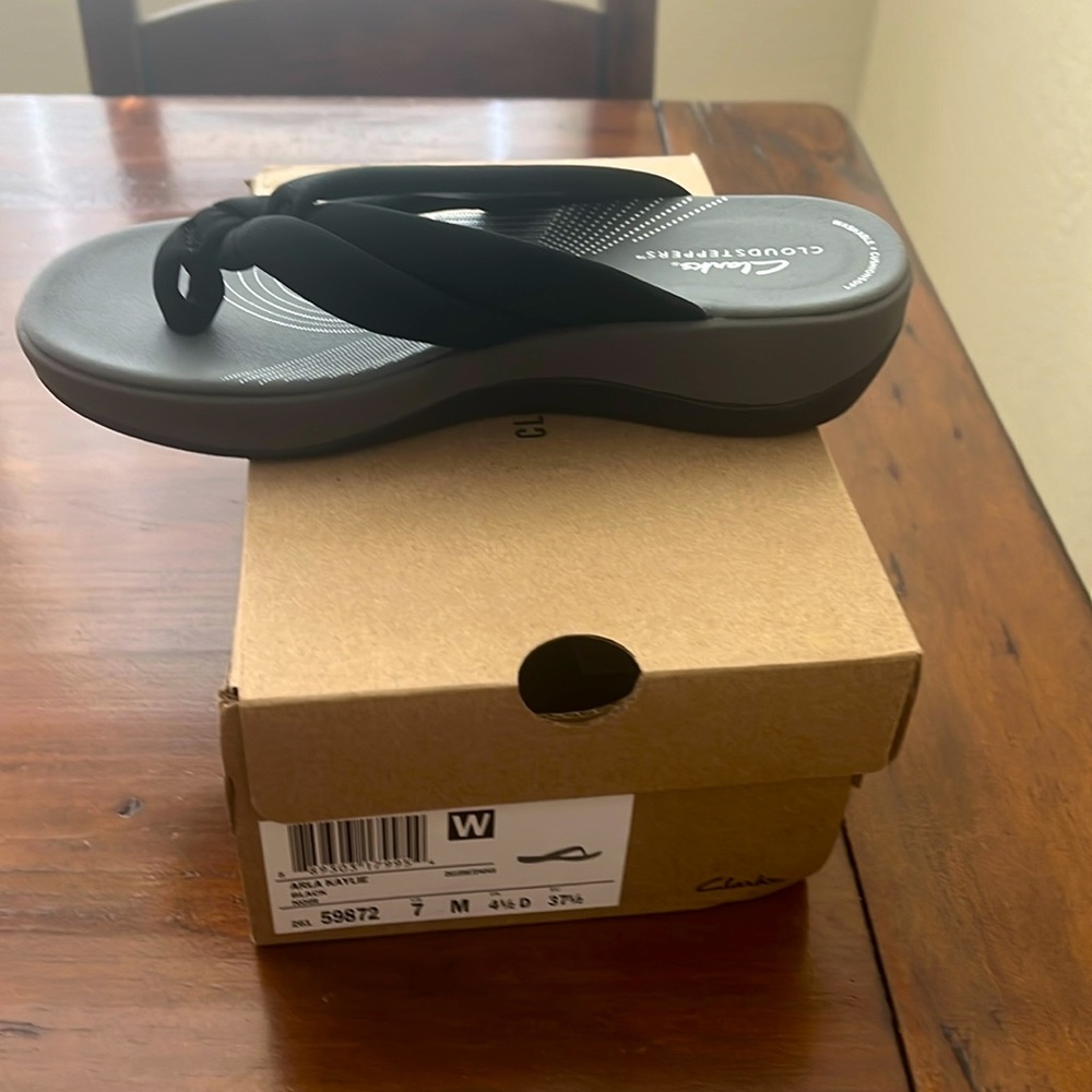 Clark’s black sandals